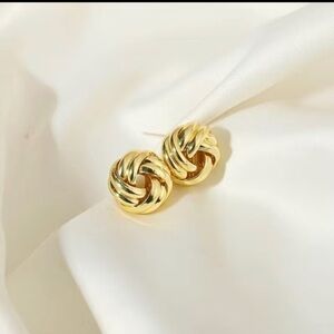 My favorite style earrings from the 80s. Gold tone knots.